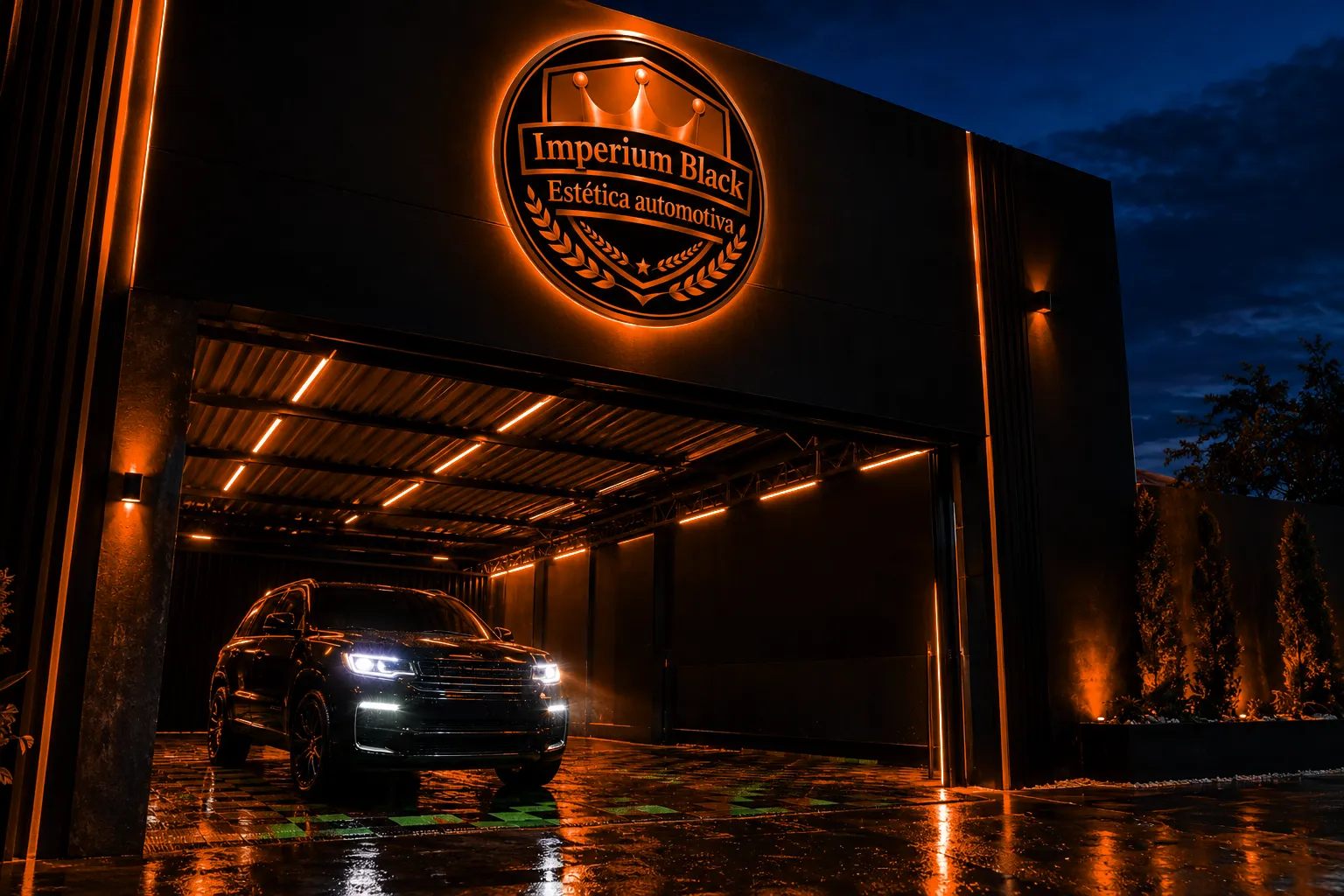 Fachada da Imperium Black à noite com o letreiro laranja